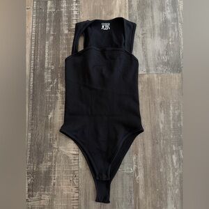 OQQ Black Ribbed Bodysuit
